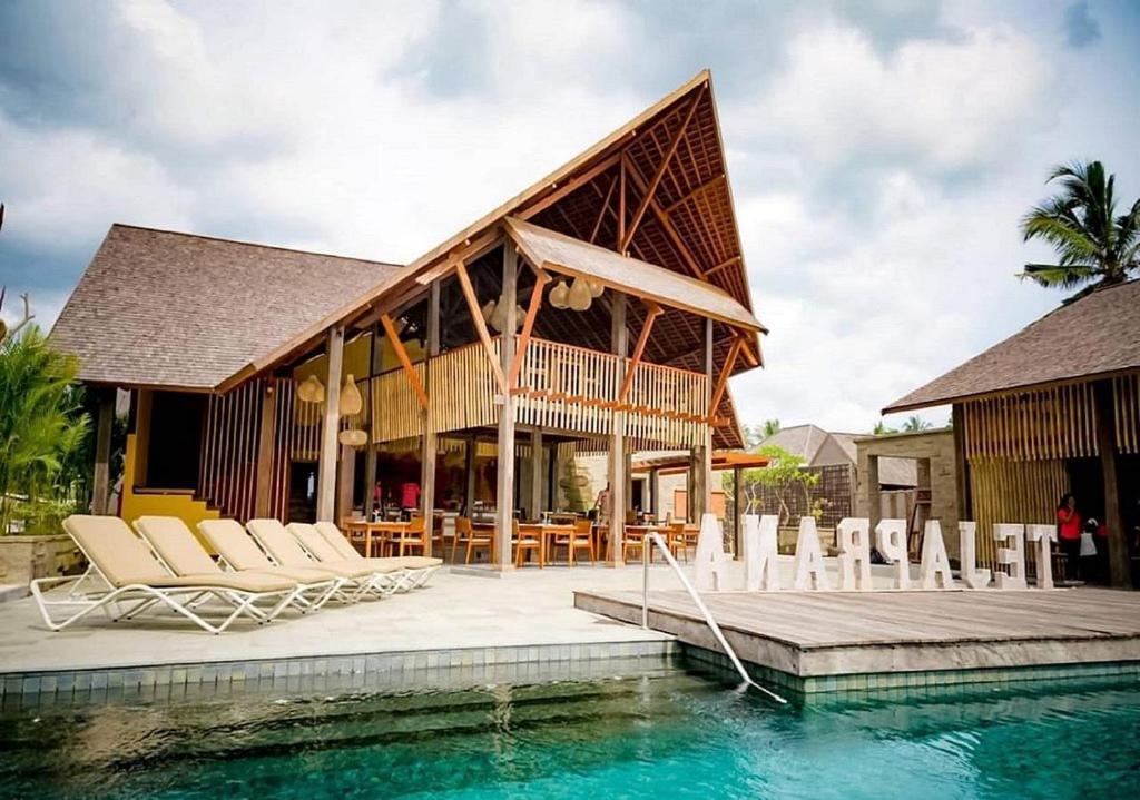 เตจาปรานา บิสมา - ผ่านการรับรอง Chse Hotel อูบุด ภายนอก รูปภาพ The resort's main pool